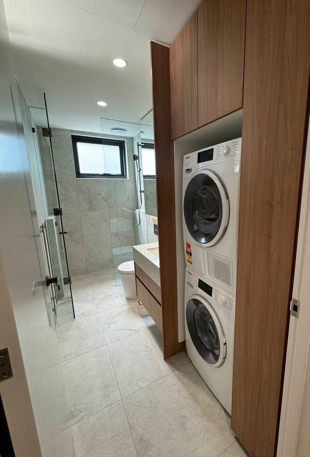 Clean bathroom and laundry area after a detailed service